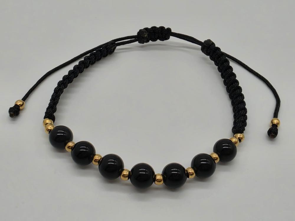 Pulsera Obsidiana Dorada Bola 6mm Ajustable Acero